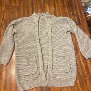 Large gray unbranded cardigan sweater.
